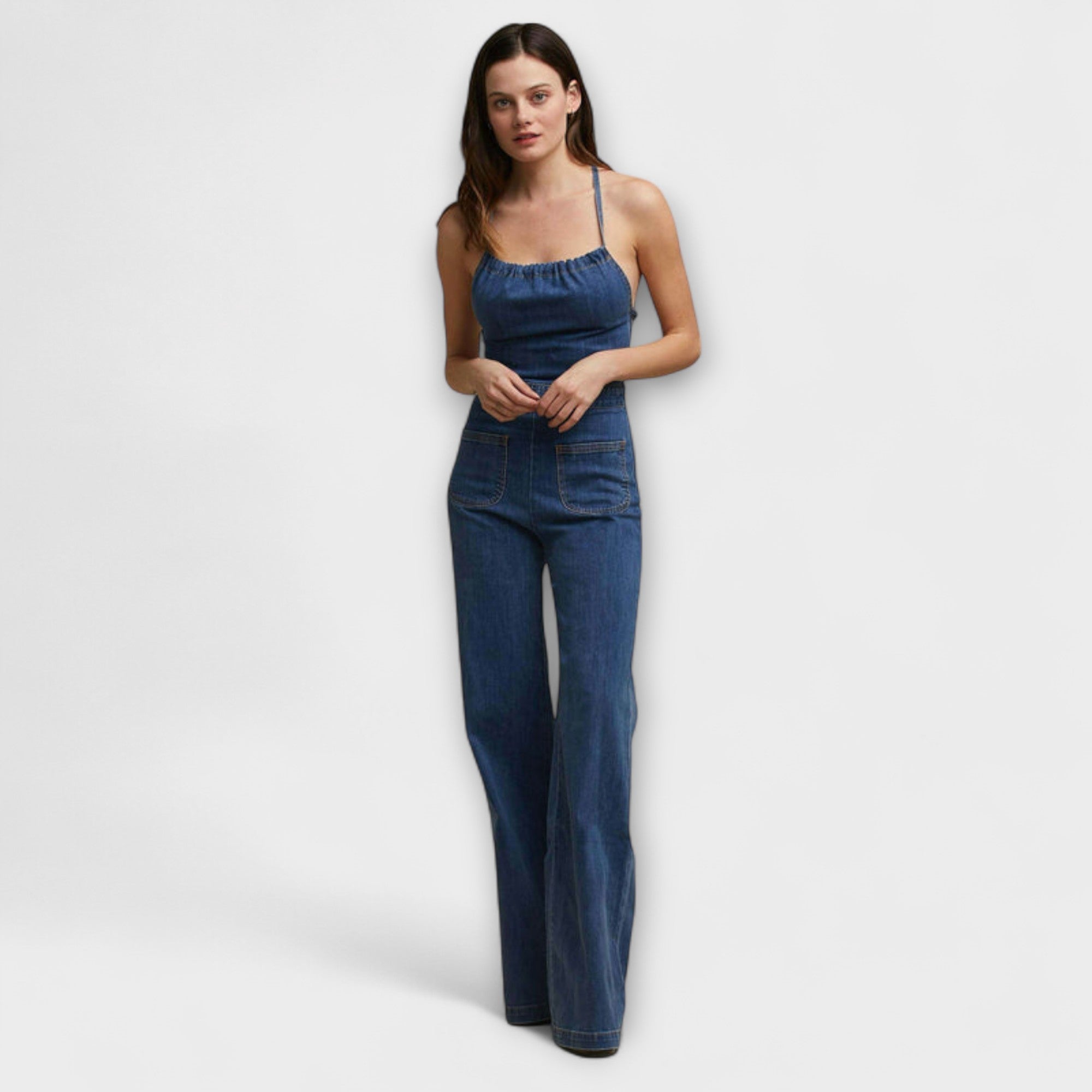 Julie - Tuta in denim svasata con dettaglio annodato